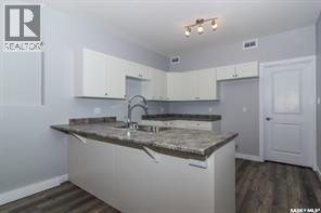 407 Boykowich Street, Saskatoon, SK - Indoor Photo Showing Kitchen With Double Sink