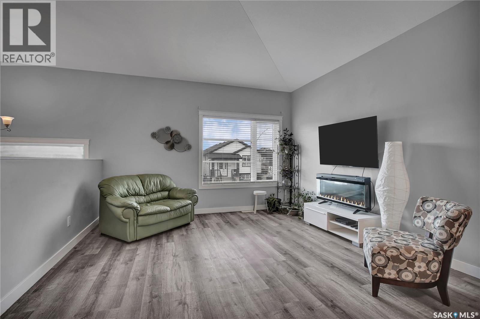 407 Boykowich Street, Saskatoon, SK - Indoor Photo Showing Living Room With Fireplace