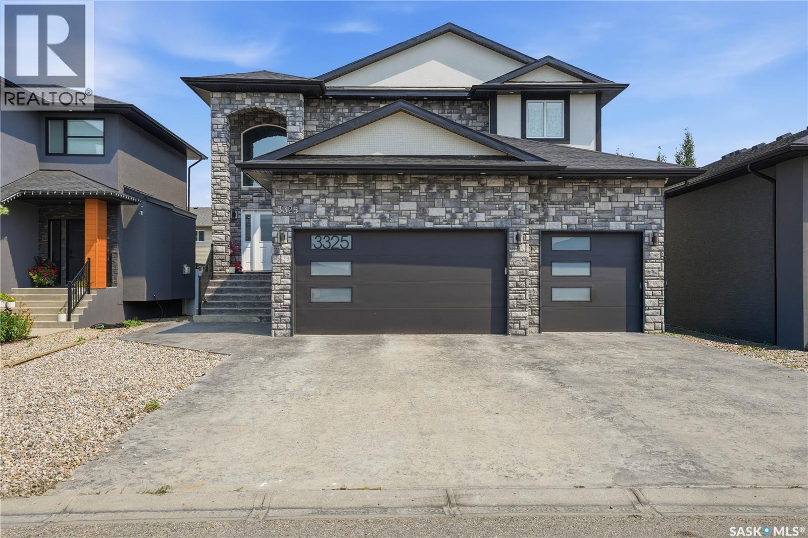 3325 Green Brook Road, Regina, SK - Outdoor With Facade