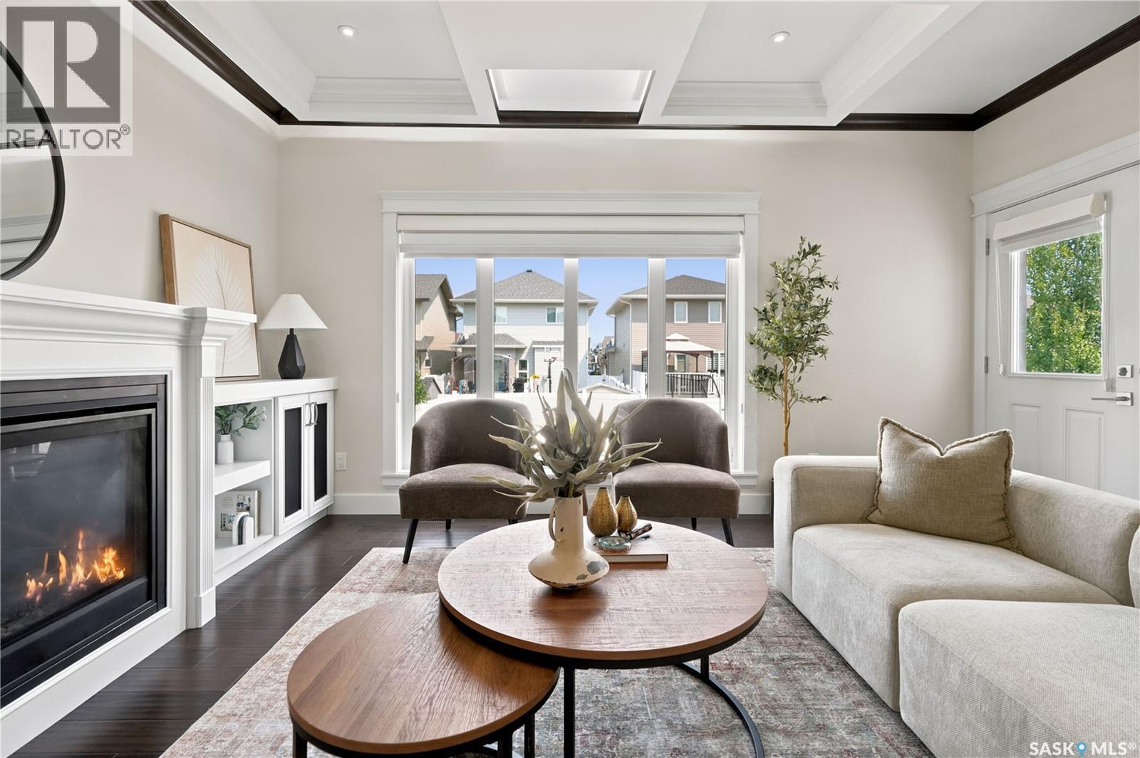 3325 Green Brook Road, Regina, SK - Indoor Photo Showing Living Room With Fireplace