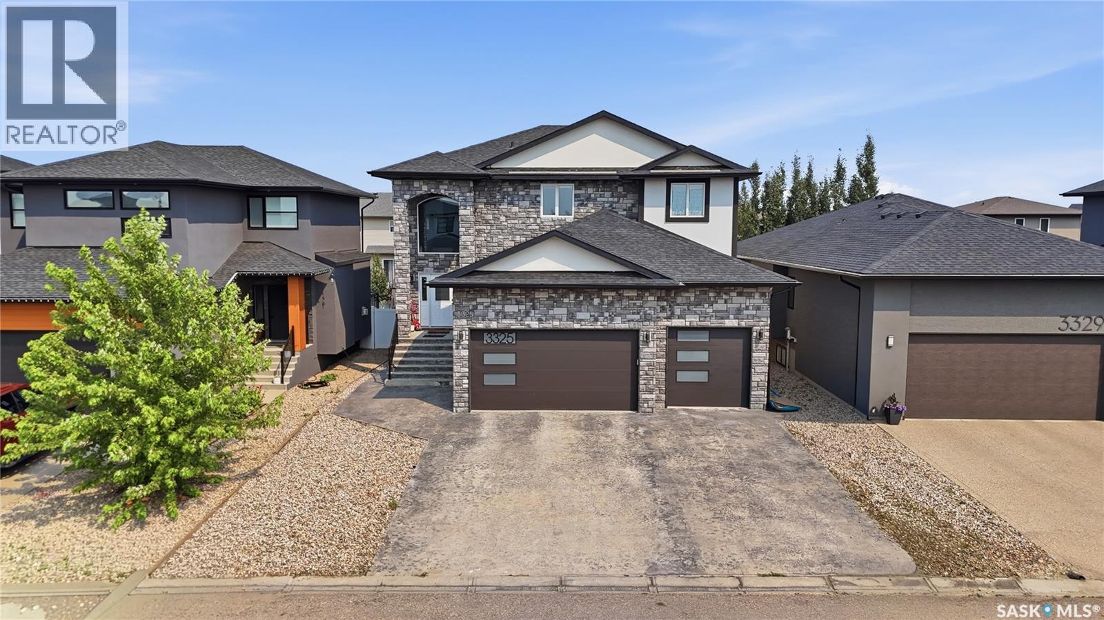 3325 Green Brook Road, Regina, SK - Outdoor With Facade