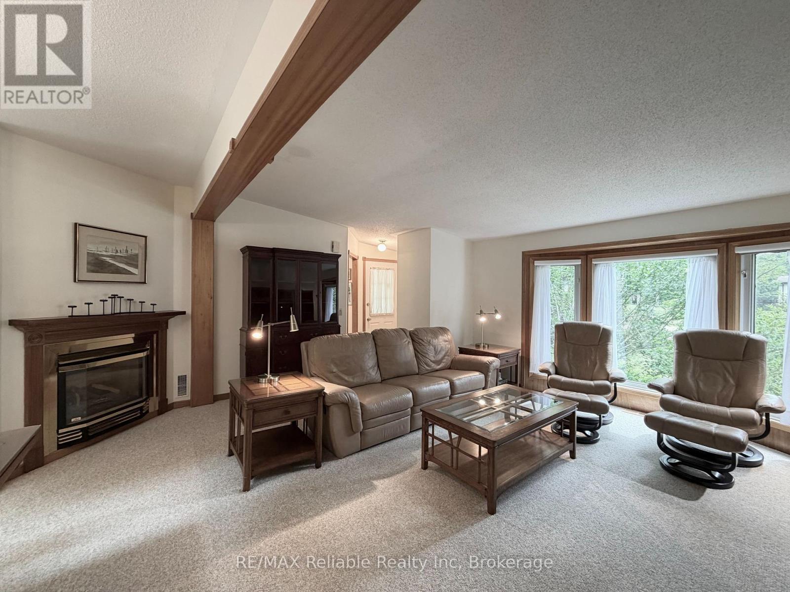 117 Tamarack Drive, Central Huron (Goderich), ON - Indoor Photo Showing Living Room With Fireplace
