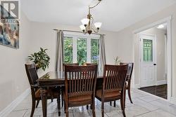 Dining area flooded with natural light - 