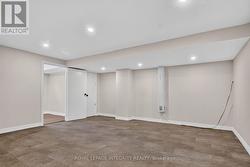 Freshly painted recreation area with pot lights - 