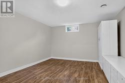 Den with built-in storage on lower level - 