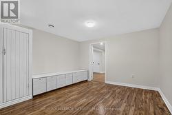 Den with built-in storage on lower level - 
