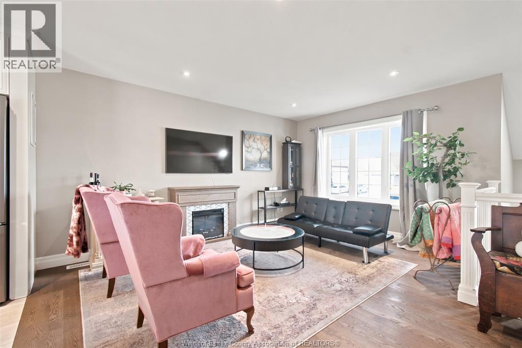 6 Joaney Lane, Cottam, ON - Indoor Photo Showing Living Room With Fireplace