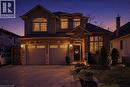Stucco and brick facade featuring a double-door entry with arched transom - 284 Normanhurst Avenue, Hamilton, ON  - Outdoor 