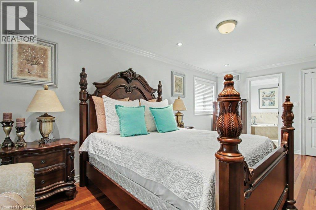 Spacious room with wood-finish flooring, recessed lighting, and crown molding - 284 Normanhurst Avenue, Hamilton, ON - Indoor Photo Showing Bedroom
