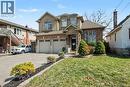 Brick and stucco facade with a two-car garage - 284 Normanhurst Avenue, Hamilton, ON  - Outdoor With Facade 