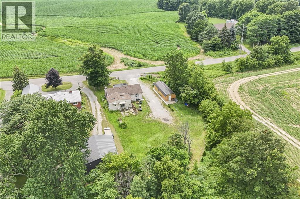 Aerial perspective highlighting a property with a light-colored exterior and a detached shed - 7332 Twenty Road E, Glanbrook, ON - Outdoor With View