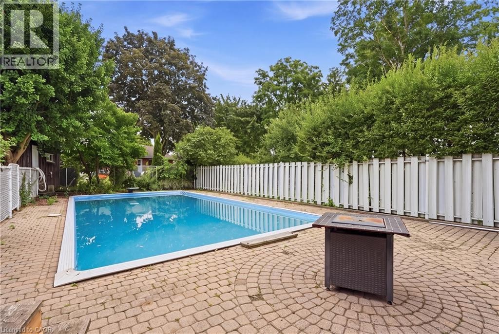 Virtually Staged - 101 Crosby Drive, Kitchener, ON - Outdoor With In Ground Pool