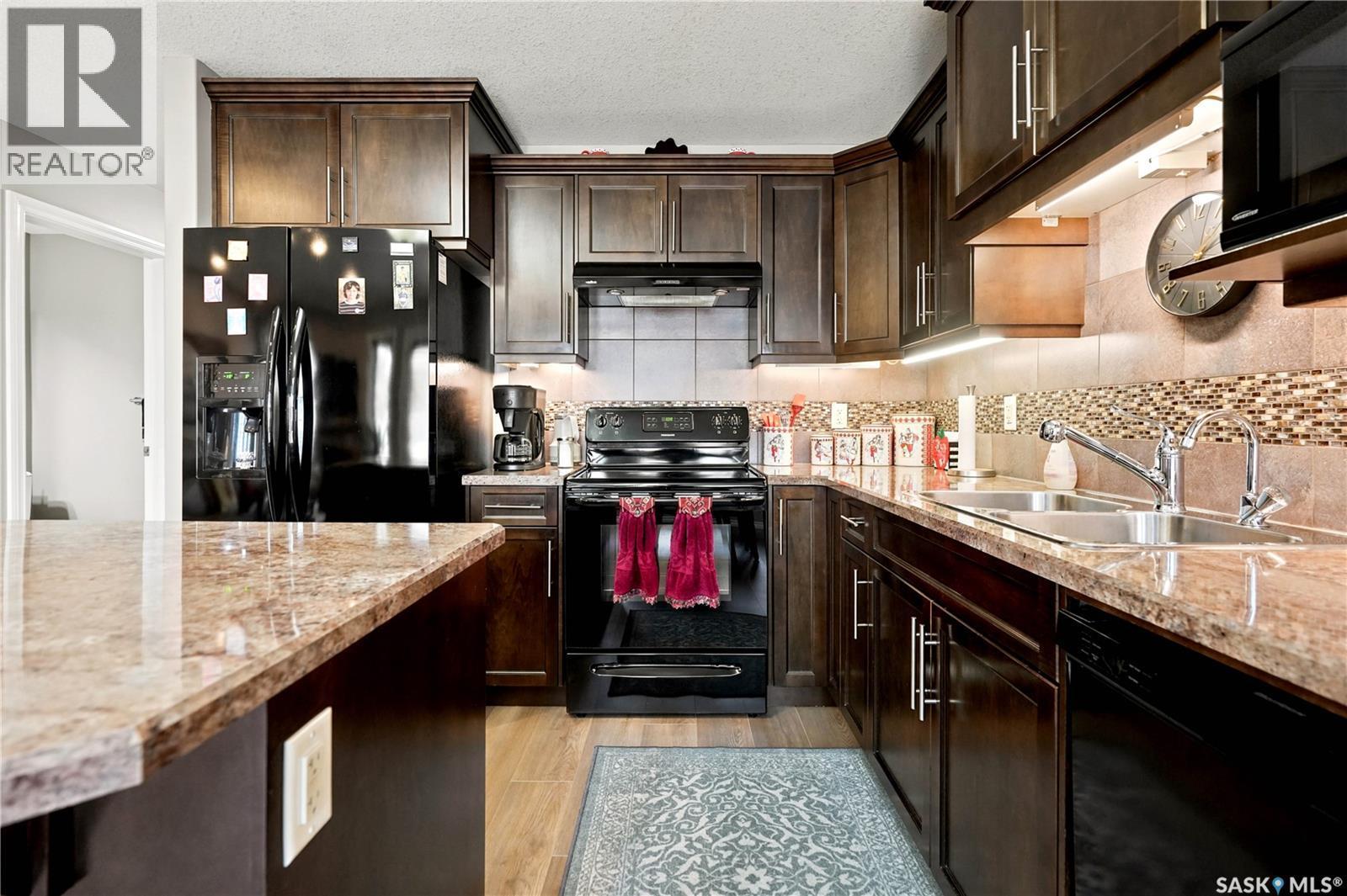 104 4100 Sandhill Crescent, Regina, SK - Indoor Photo Showing Kitchen With Double Sink With Upgraded Kitchen