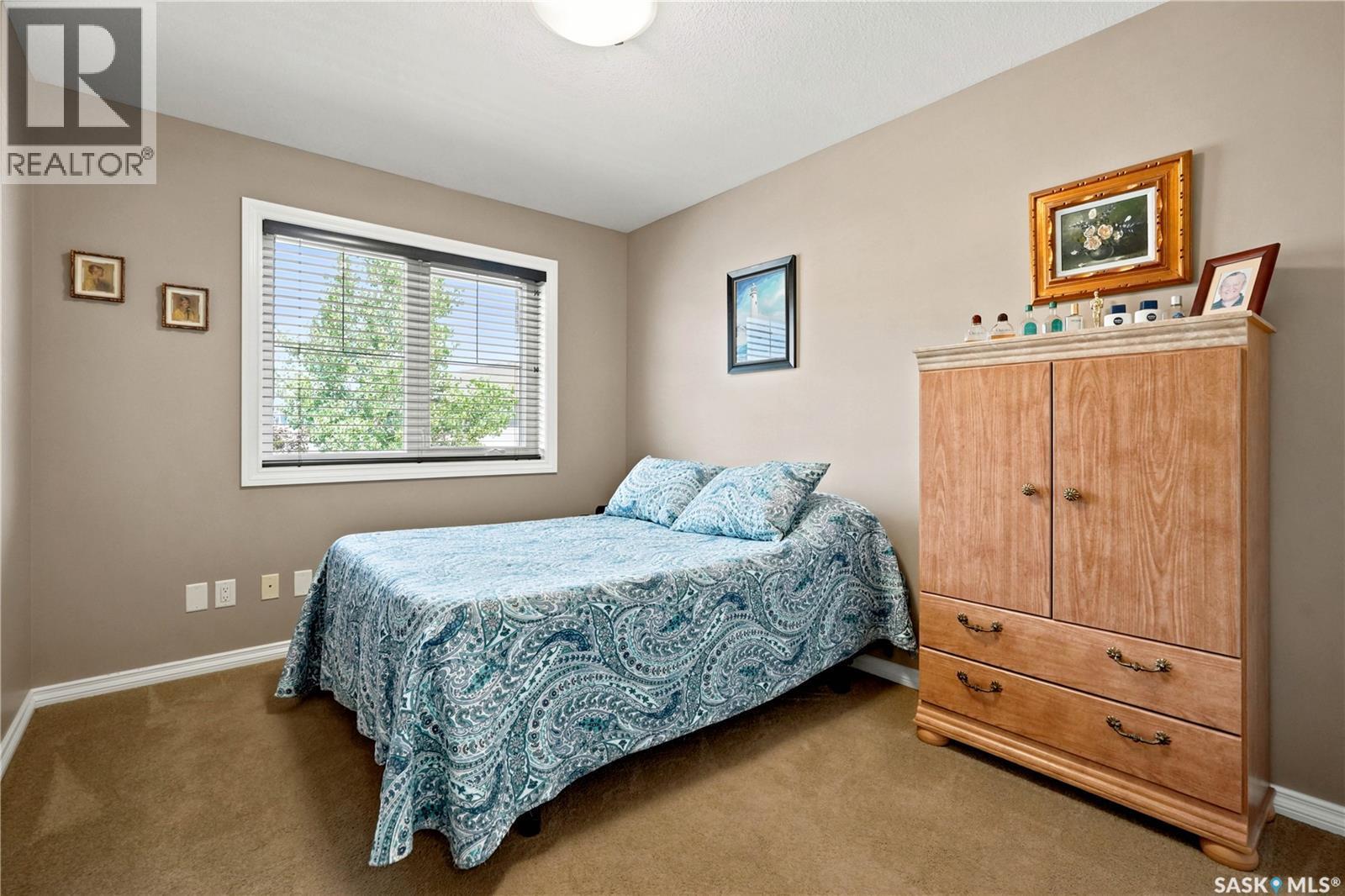 104 4100 Sandhill Crescent, Regina, SK - Indoor Photo Showing Bedroom