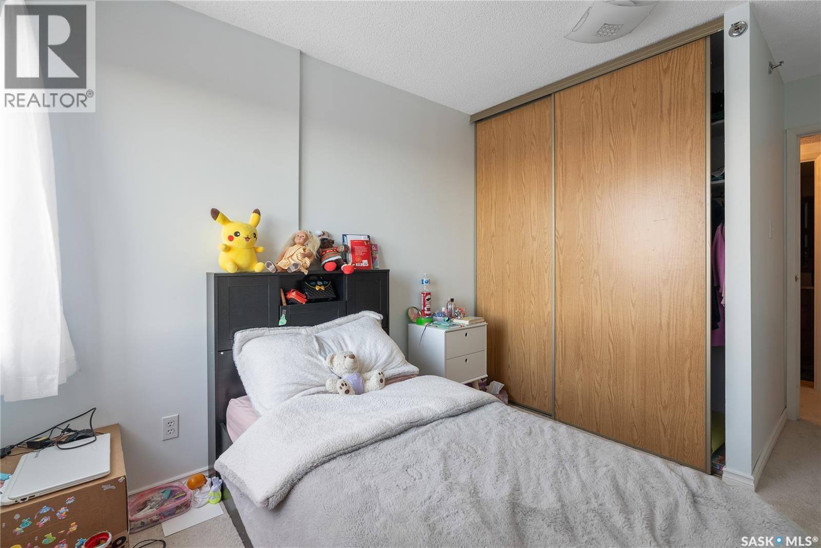 701 430 5Th Avenue N, Saskatoon, SK - Indoor Photo Showing Bedroom