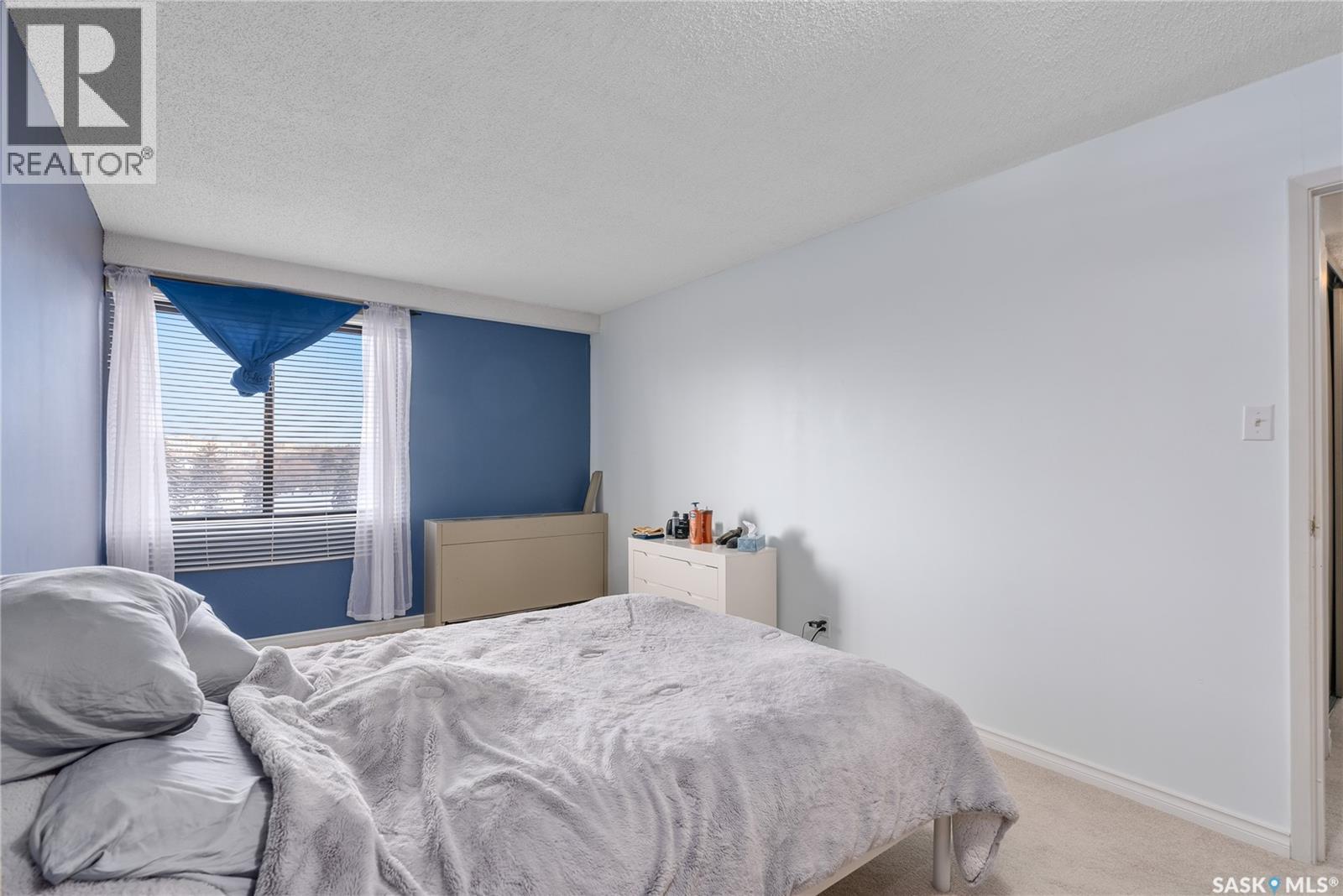 701 430 5Th Avenue N, Saskatoon, SK - Indoor Photo Showing Bedroom