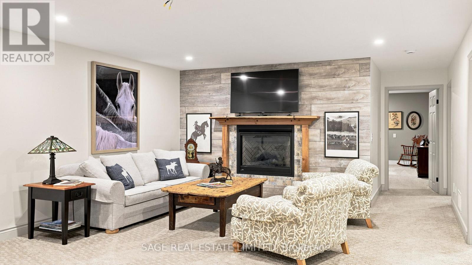 7632 County 9 Road, Clearview, ON - Indoor Photo Showing Living Room With Fireplace