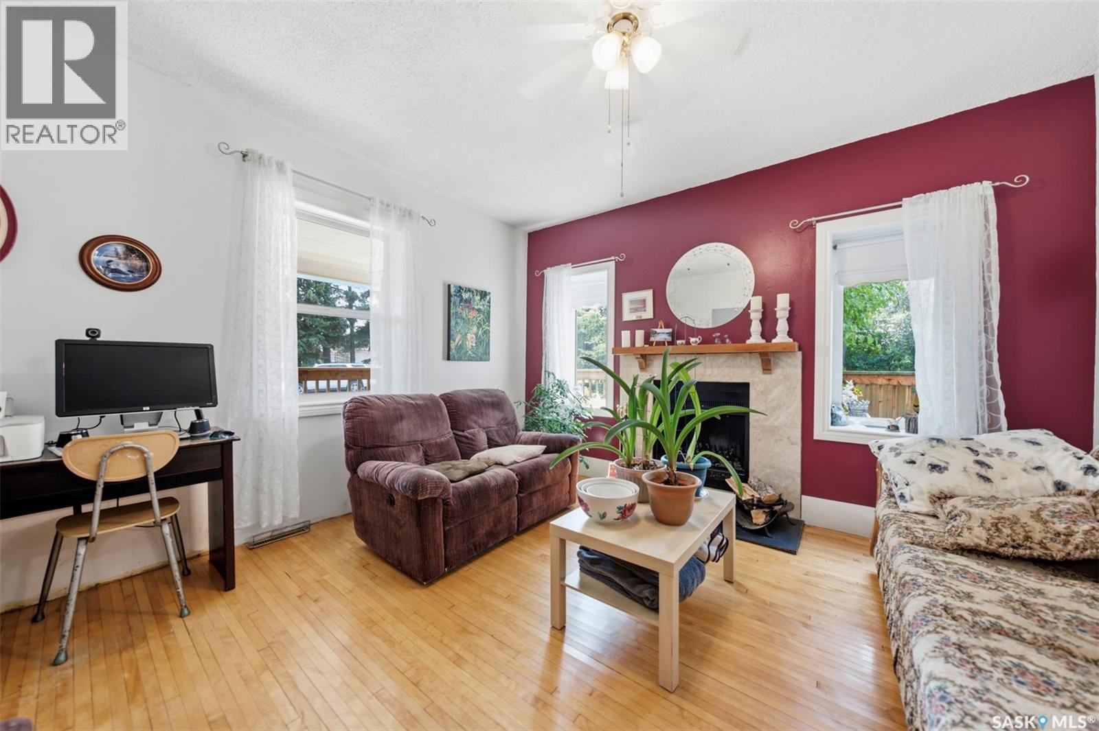 513 1St Street E, Hepburn, SK - Indoor Photo Showing Living Room With Fireplace