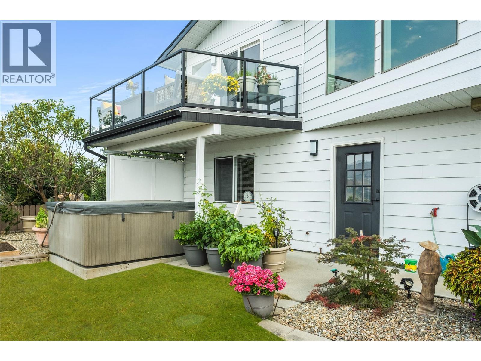 Back Yard and Hot Tub - 4119 15 Avenue, Vernon, BC - Outdoor With Deck Patio Veranda