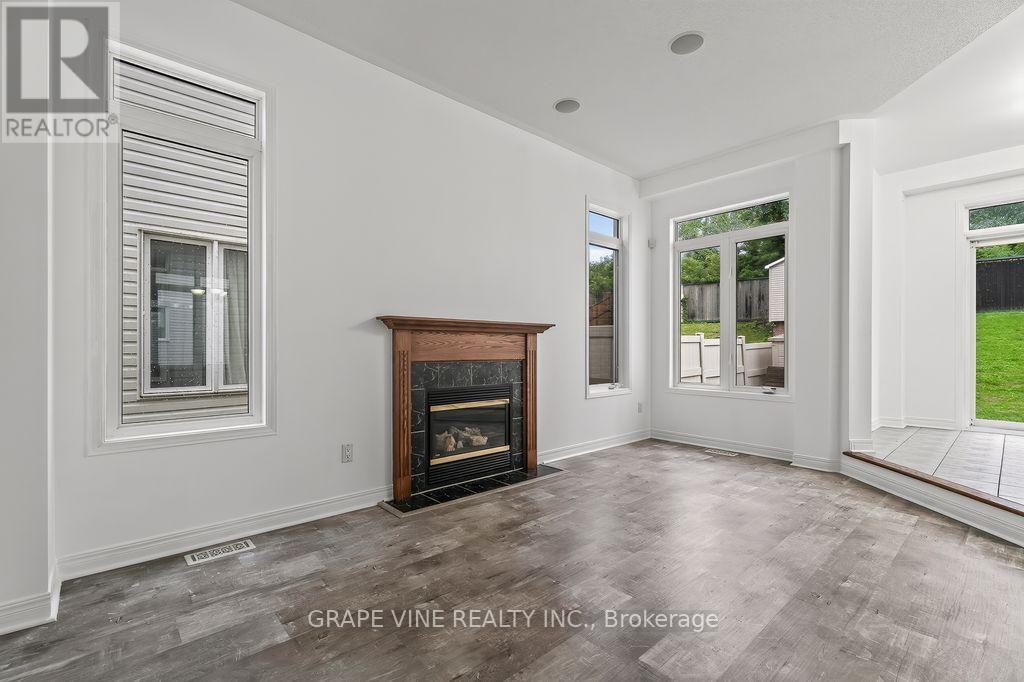 105 Rowallen Place, Ottawa, ON - Indoor Photo Showing Living Room With Fireplace