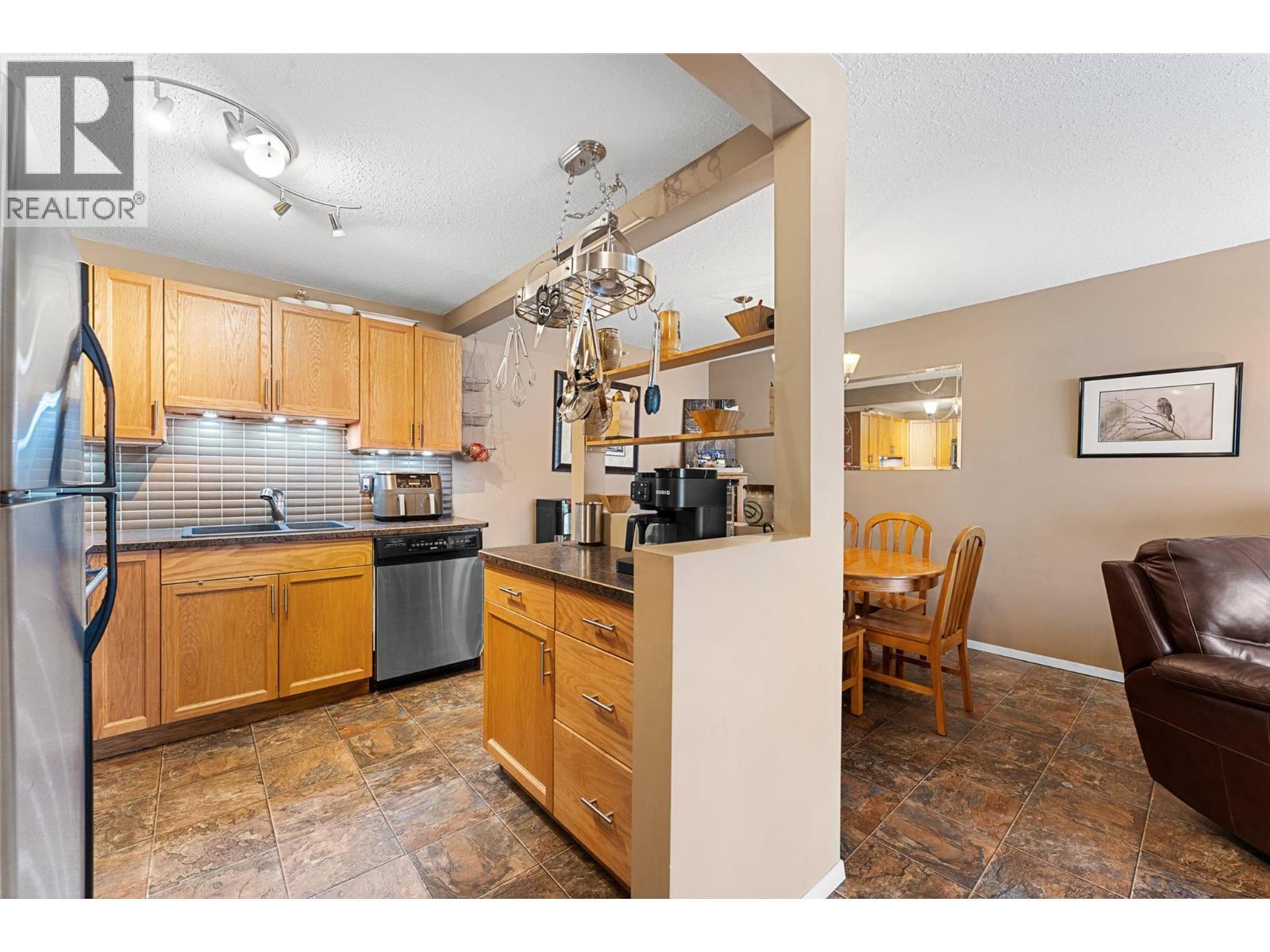 284 Yortkon Avenue Unit# 205, Penticton, BC - Indoor Photo Showing Kitchen With Stainless Steel Kitchen With Double Sink