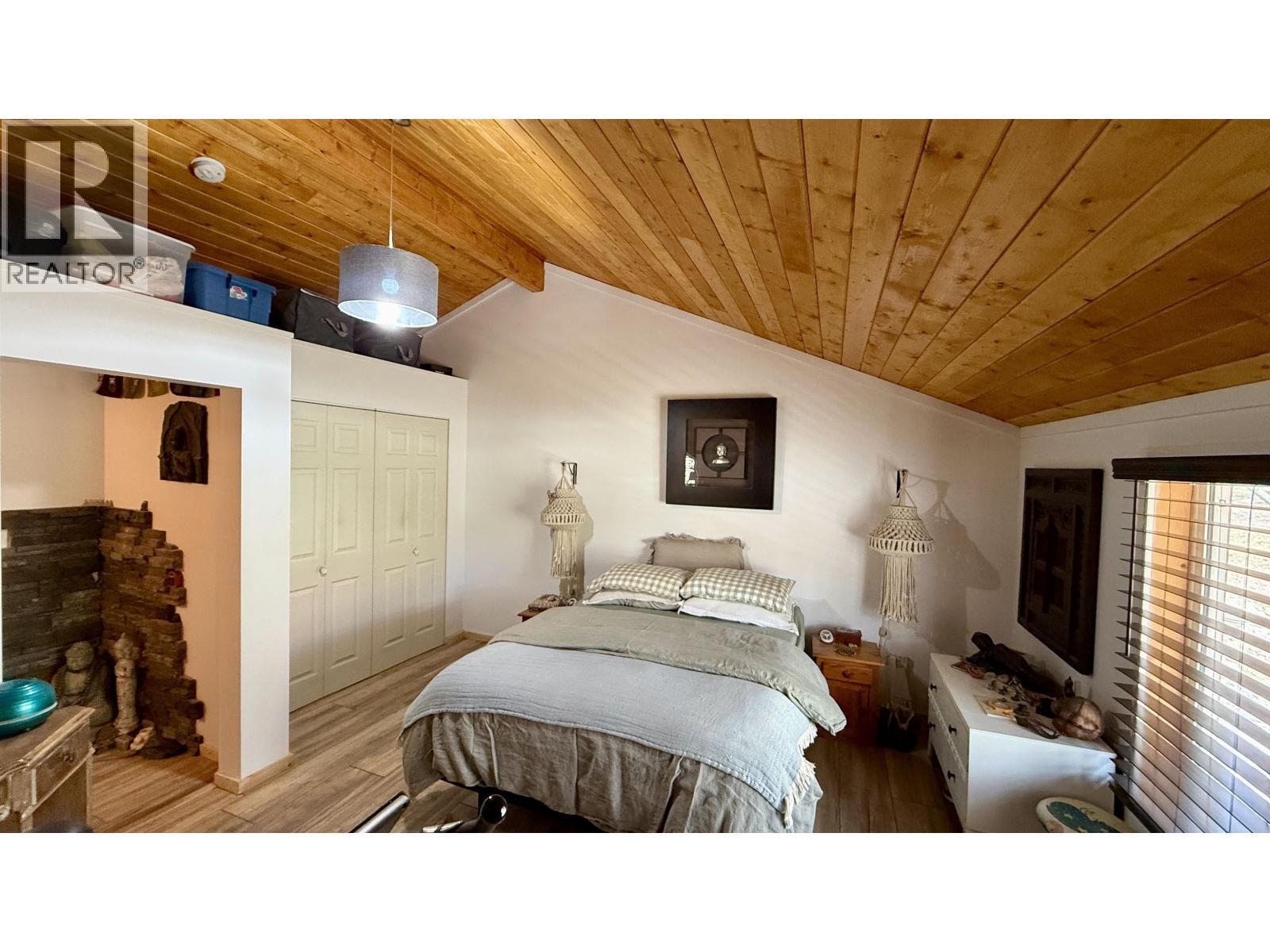 4863 Cumsu Place, 108 Mile Ranch, BC - Indoor Photo Showing Bedroom
