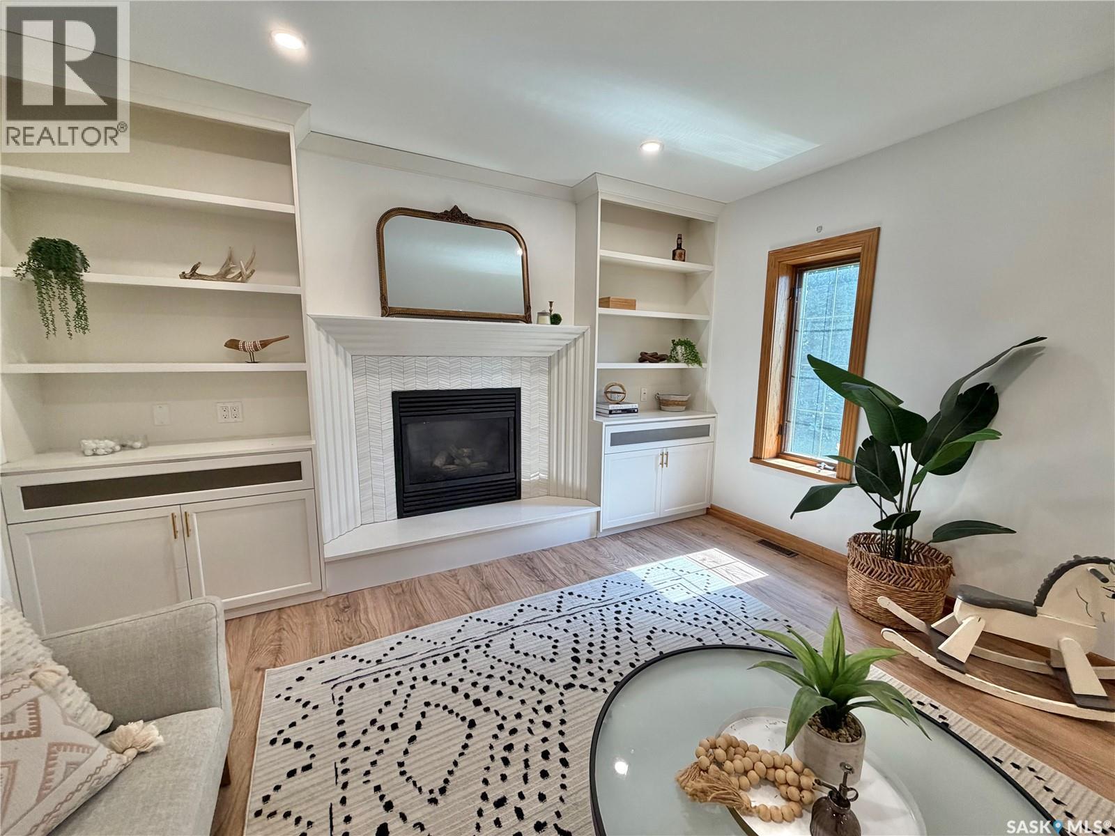116 Morrison Drive, Yorkton, SK - Indoor Photo Showing Living Room With Fireplace