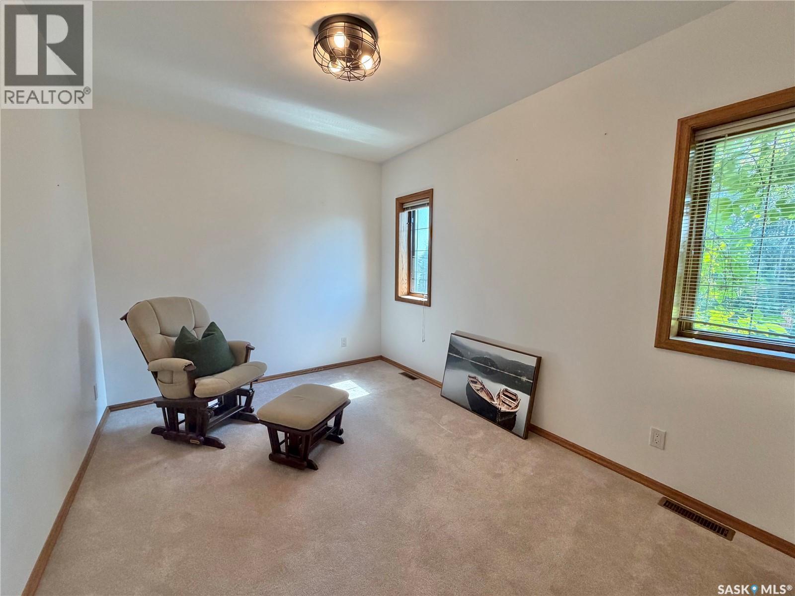 116 Morrison Drive, Yorkton, SK - Indoor Photo Showing Other Room With Fireplace