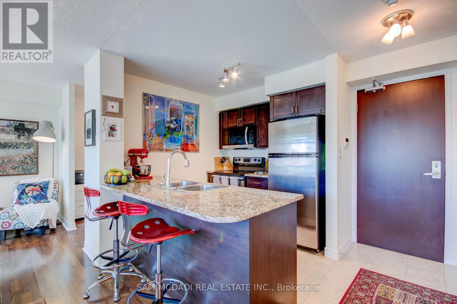 2205 - 208 Enfield Place, Mississauga, ON - Indoor Photo Showing Kitchen With Double Sink