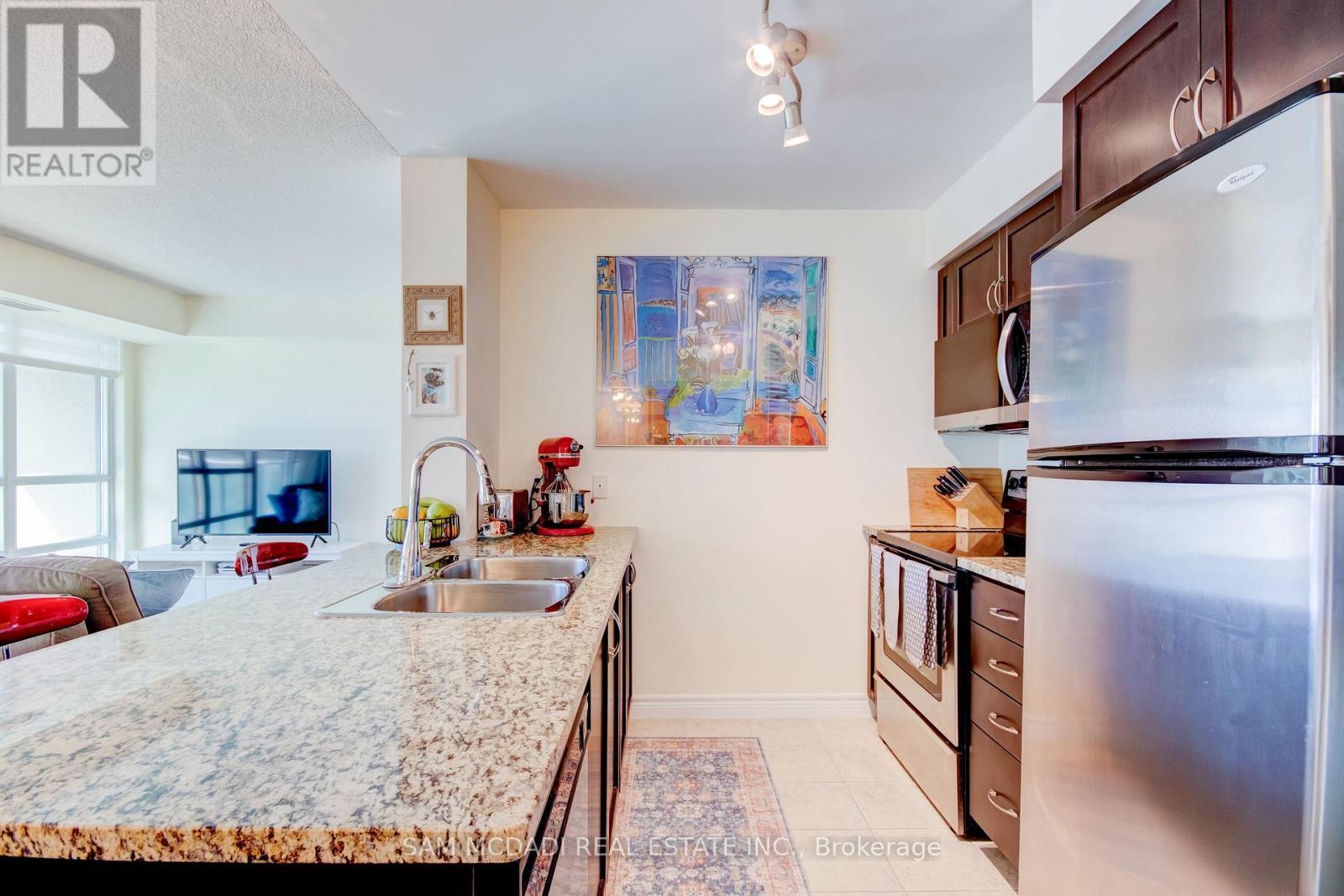 2205 - 208 Enfield Place, Mississauga, ON - Indoor Photo Showing Kitchen With Double Sink