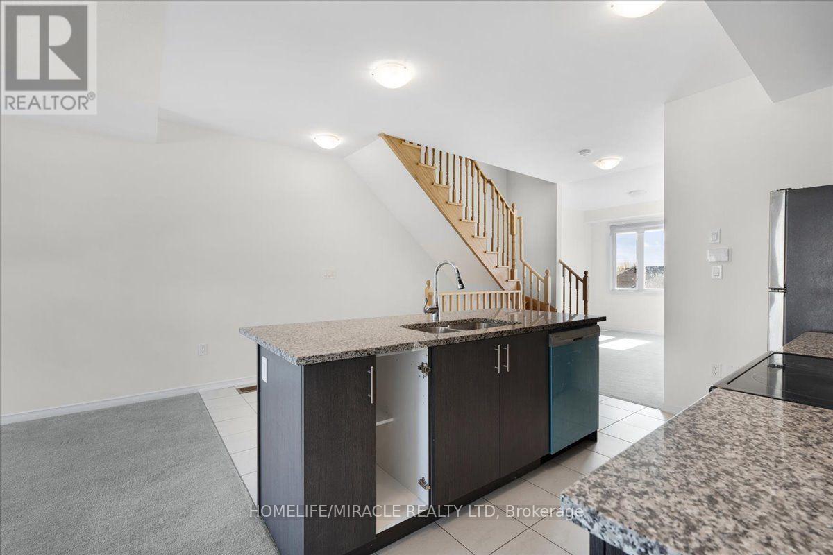 1392 Coral Springs Path, Oshawa, ON - Indoor Photo Showing Kitchen With Double Sink