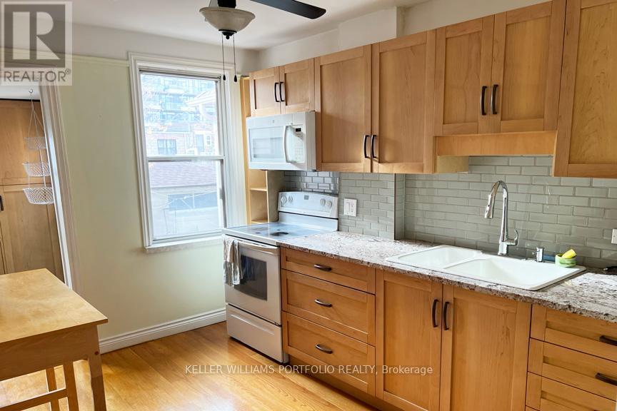 97 Livingstone Avenue, Toronto, ON - Indoor Photo Showing Kitchen With Double Sink