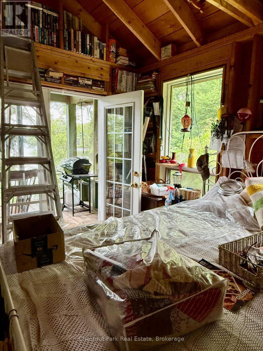 Sleeping area of main cottage, walkout to porch - 50 Cache Lake Apl1322, South Algonquin, ON - Indoor