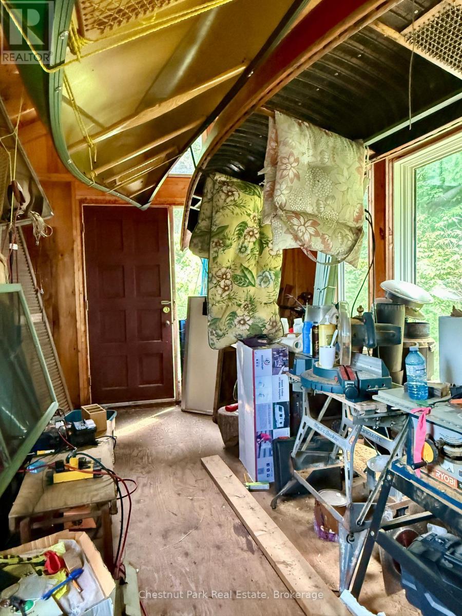 Bunkie interior. Comes w/ many treasures/equipment - 50 Cache Lake Apl1322, South Algonquin, ON - Photo Showing Other Room
