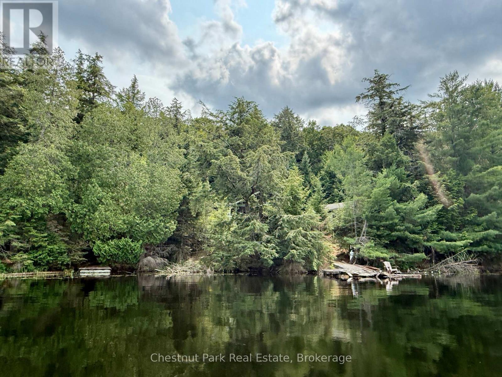 Another view of the frontage - 50 Cache Lake Apl1322, South Algonquin, ON - Outdoor With Body Of Water With View
