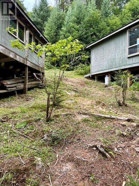 Easy slope up from the dock to building entrances - 50 Cache Lake Apl1322, South Algonquin, ON - Outdoor With Deck Patio Veranda