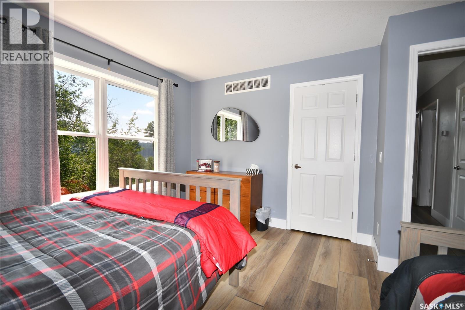 17 Tranquility Drive, Cowan Lake, SK - Indoor Photo Showing Bedroom