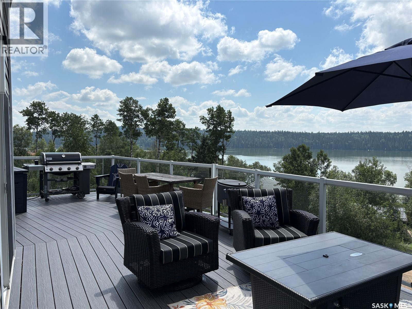 17 Tranquility Drive, Cowan Lake, SK - Outdoor With Body Of Water With Deck Patio Veranda With Exterior