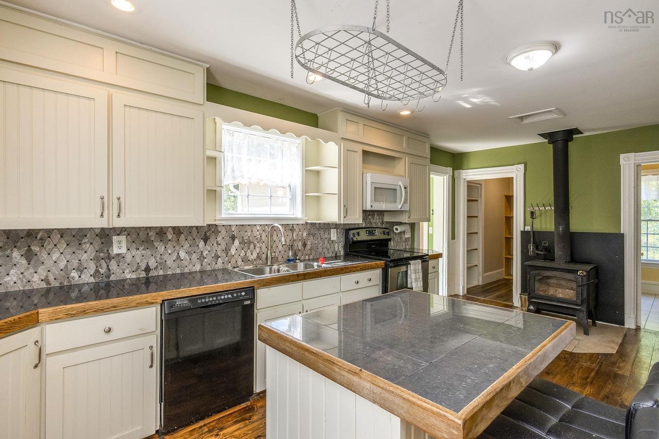 4902 Highway 1, Waterville, NS - Indoor Photo Showing Kitchen With Fireplace With Double Sink