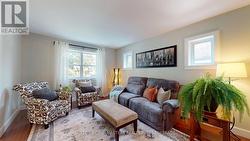 lovely living room with windows on two sides -