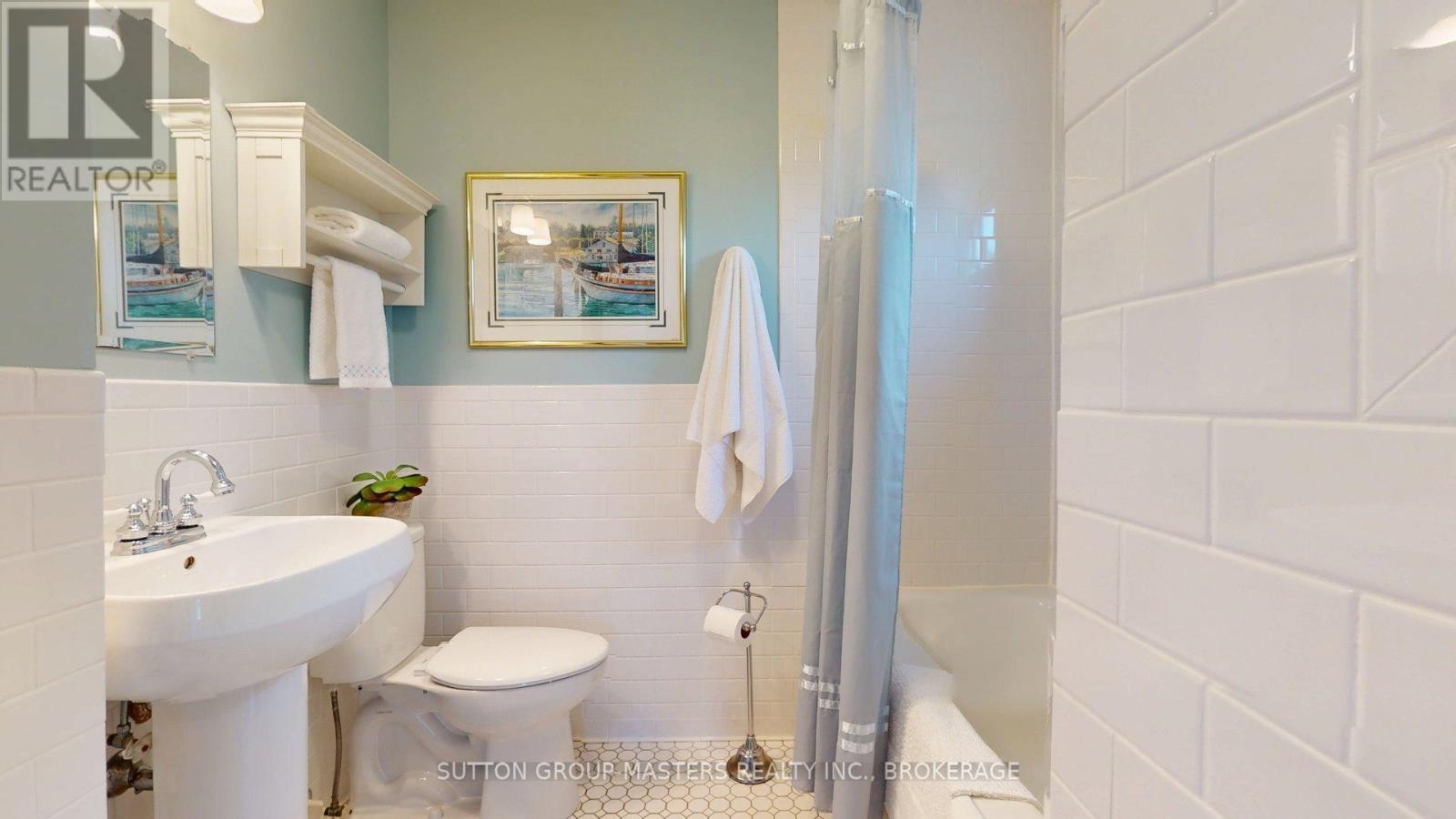 terrific main bath tiled all around - 160 Napier Street, Kingston (Central City East), ON - Indoor Photo Showing Bathroom