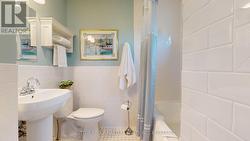 terrific main bath tiled all around -