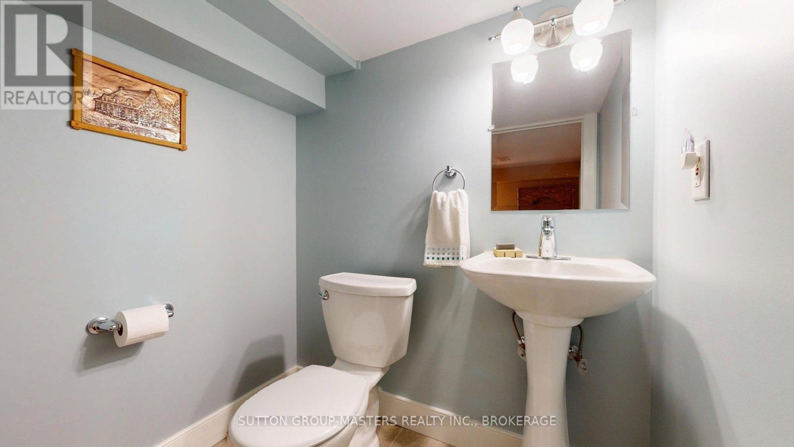 lower level powder room is another rarity - 160 Napier Street, Kingston (Central City East), ON - Indoor Photo Showing Bathroom