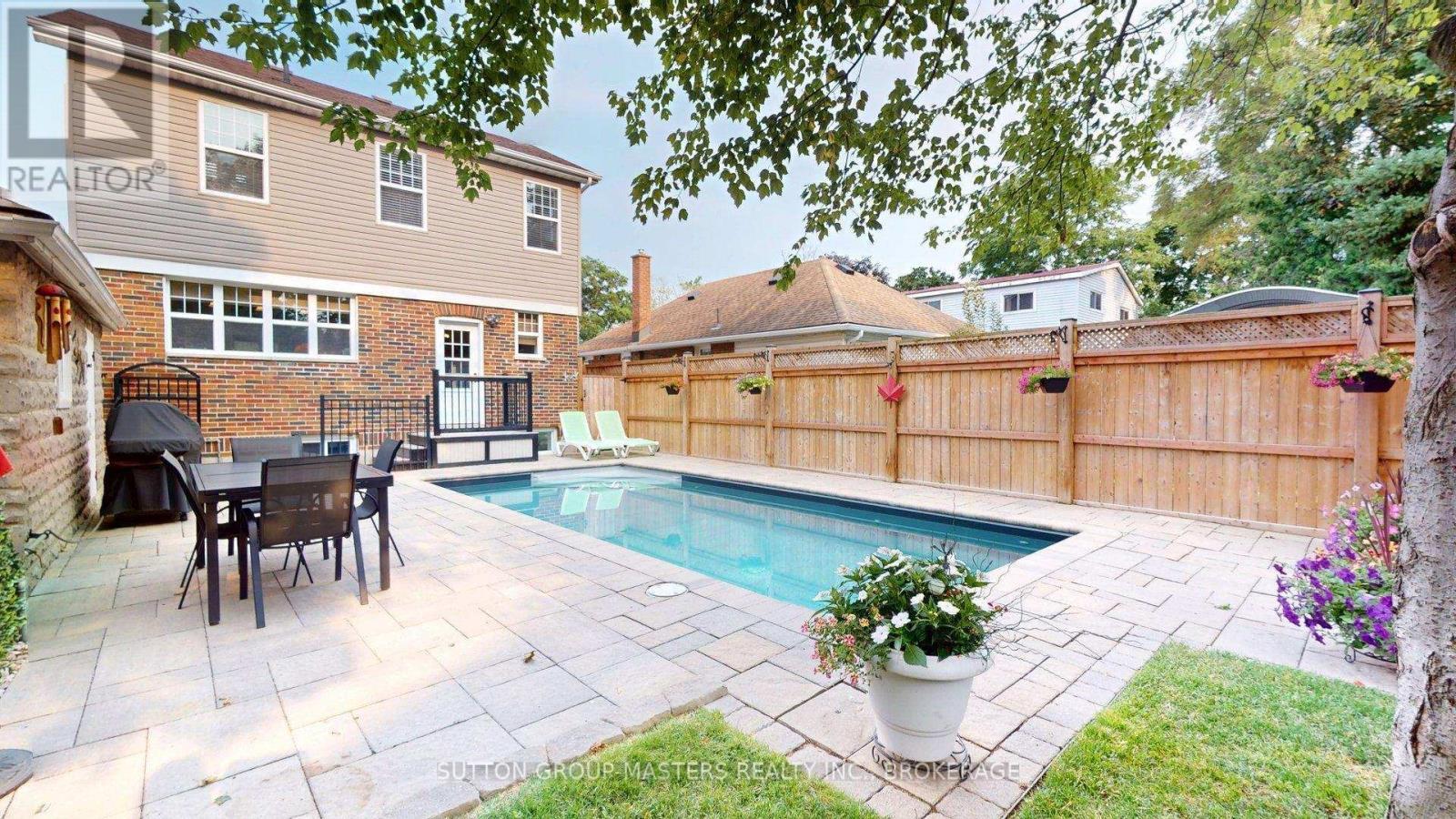 Excellent privacy for backyard relaxation - 160 Napier Street, Kingston (Central City East), ON - Outdoor With In Ground Pool With Deck Patio Veranda