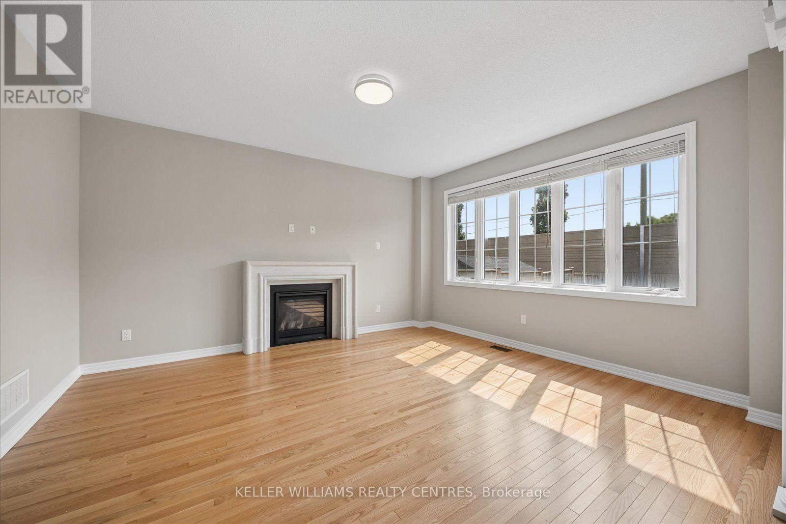 668 Mcgregor Farm Trail, Newmarket, ON - Indoor Photo Showing Living Room With Fireplace