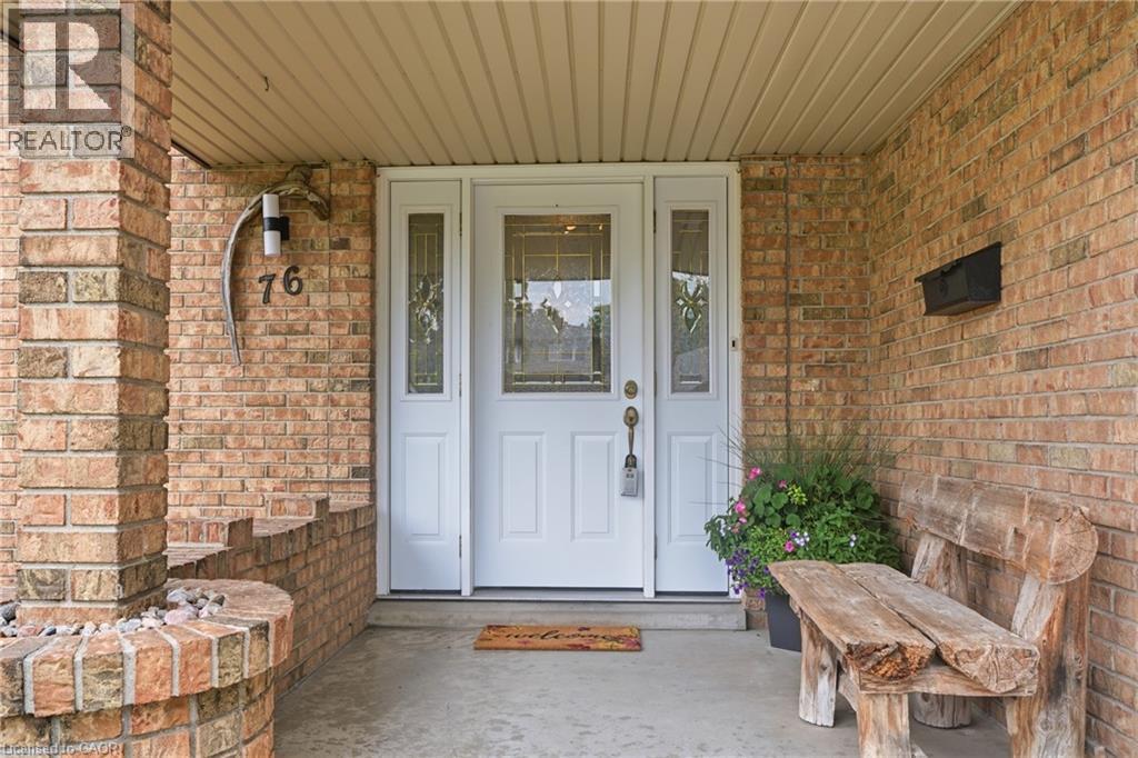 Brick exterior with a covered concrete porch - 76 Lower Canada Crescent, Kitchener, ON - Outdoor With Deck Patio Veranda With Exterior