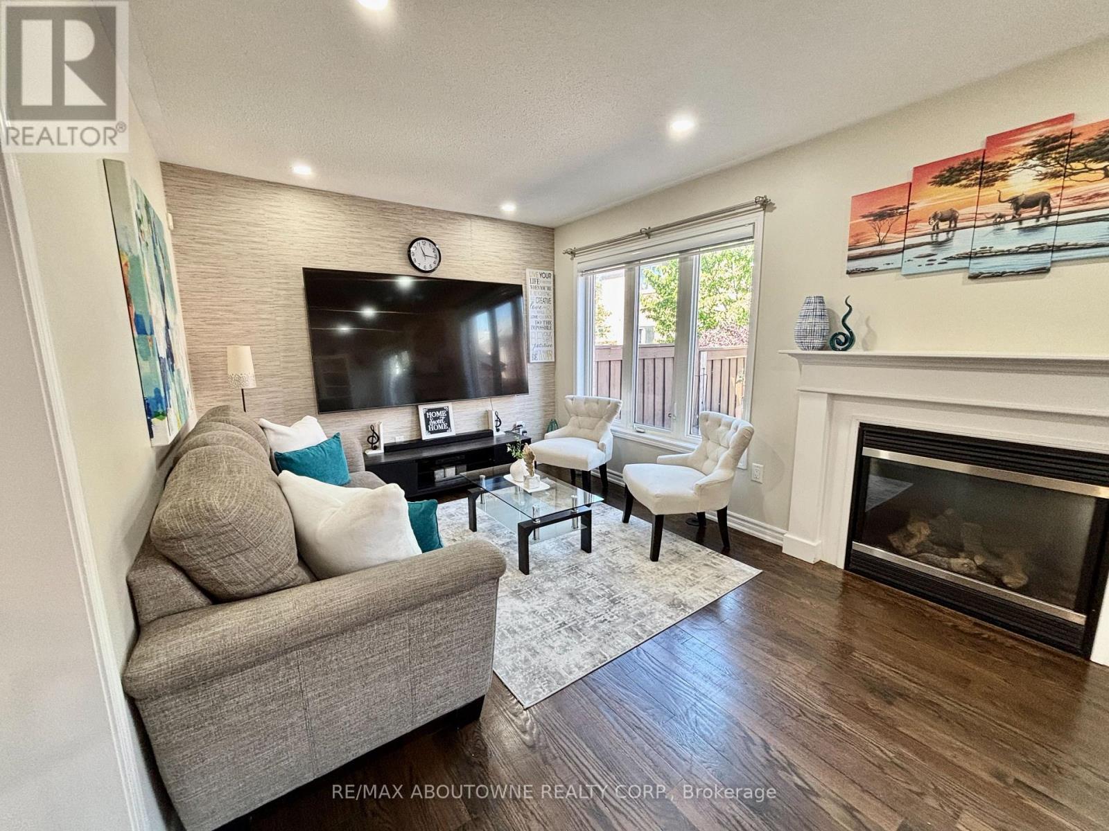 36 Van Fleet Terrace, Milton, ON - Indoor Photo Showing Living Room With Fireplace