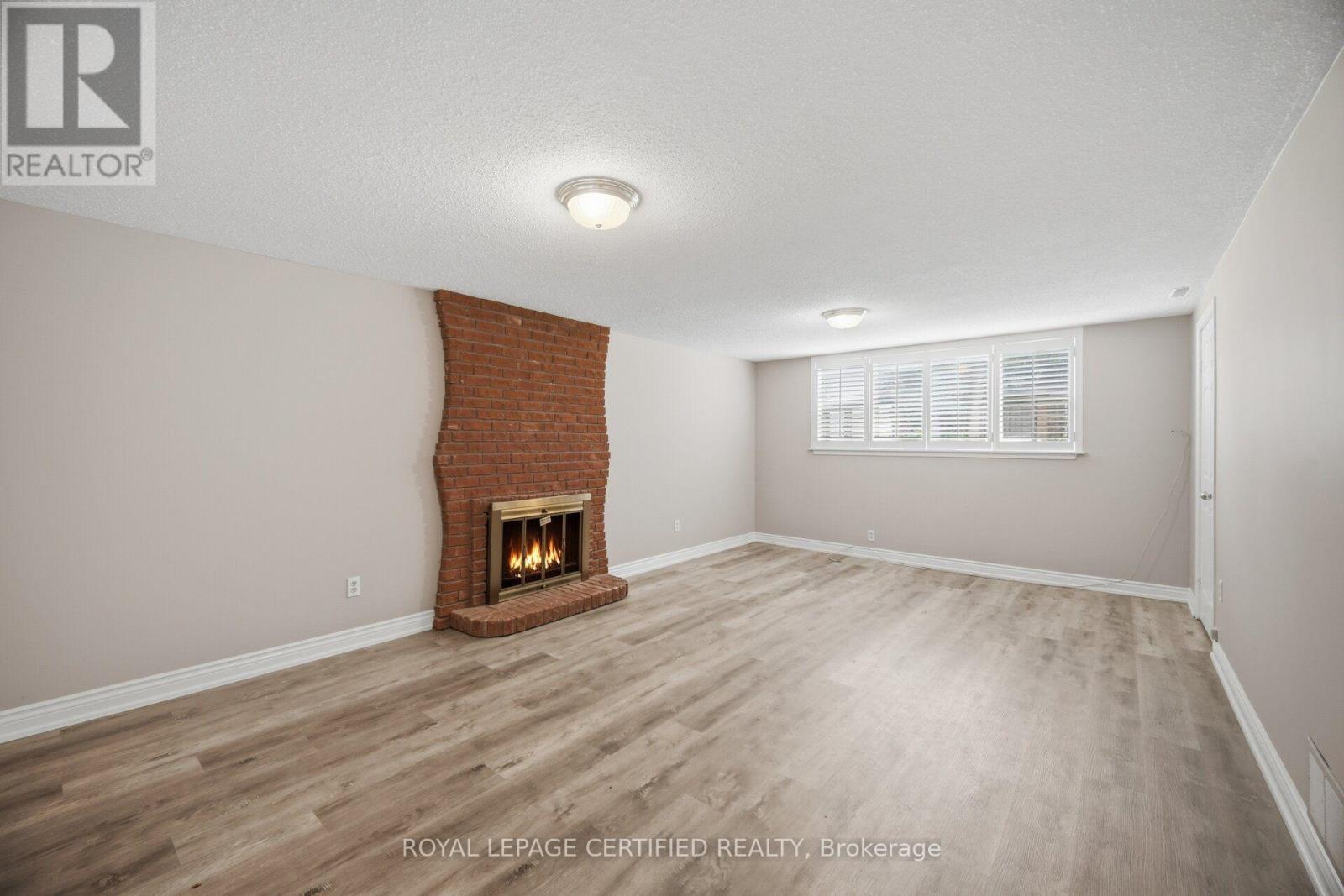 33 Grassmere Crescent, Brampton, ON - Indoor With Fireplace