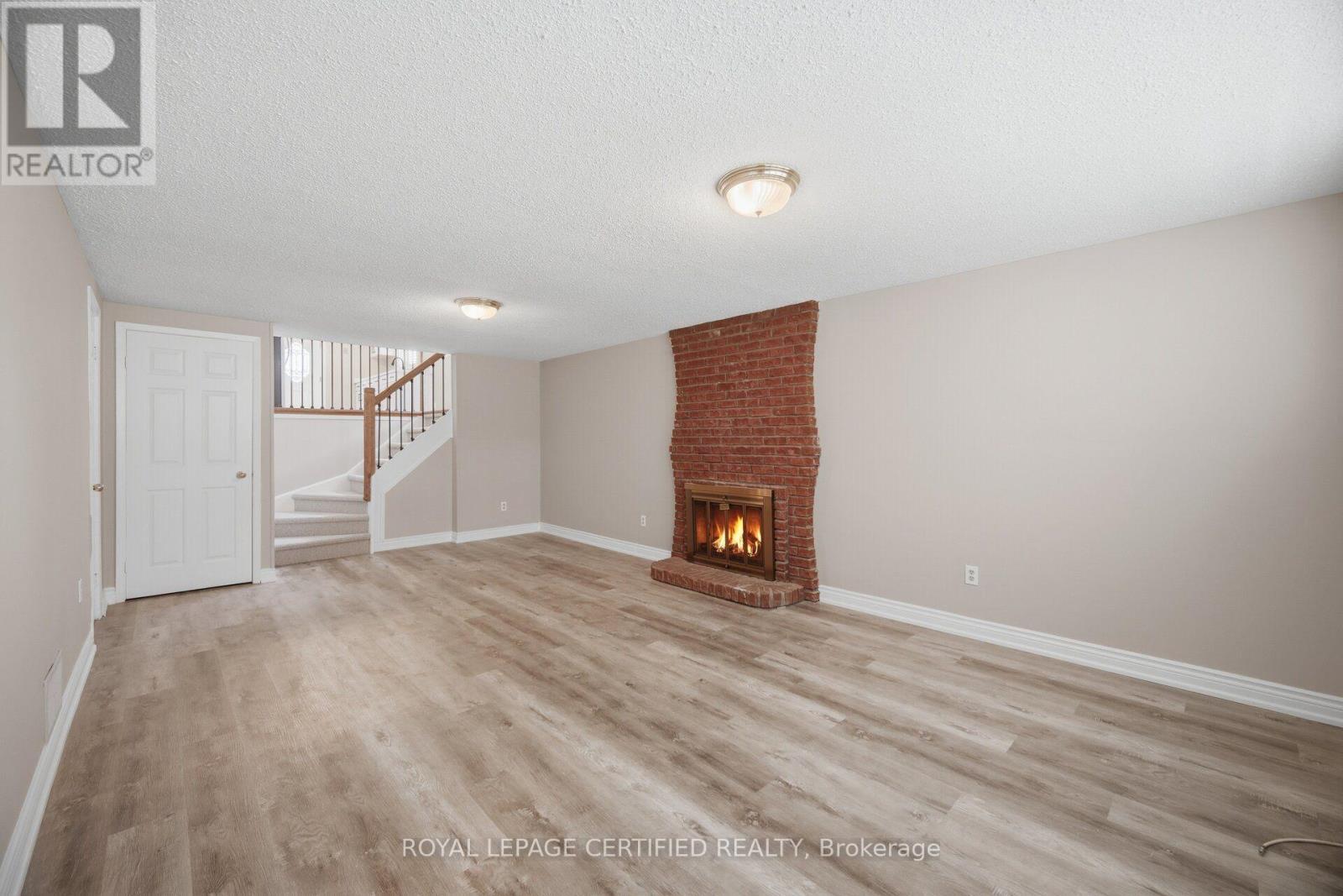 33 Grassmere Crescent, Brampton, ON - Indoor With Fireplace