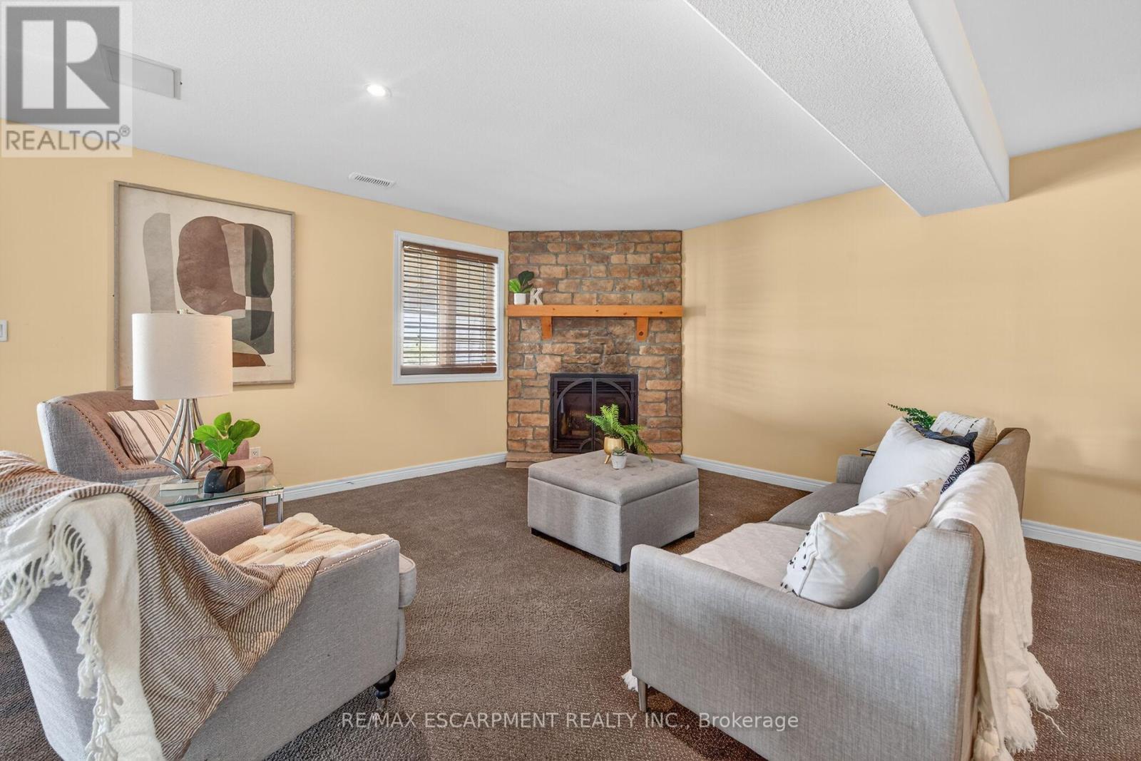 1140 River Road, Haldimand, ON - Indoor Photo Showing Living Room With Fireplace